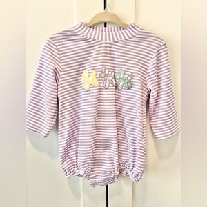 Smocked Mardi Gras’s Purple Balloon Dog bubble